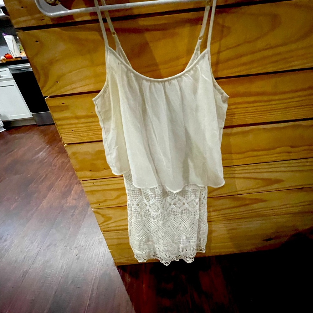 White dress with sheer top connected to a lace bottom